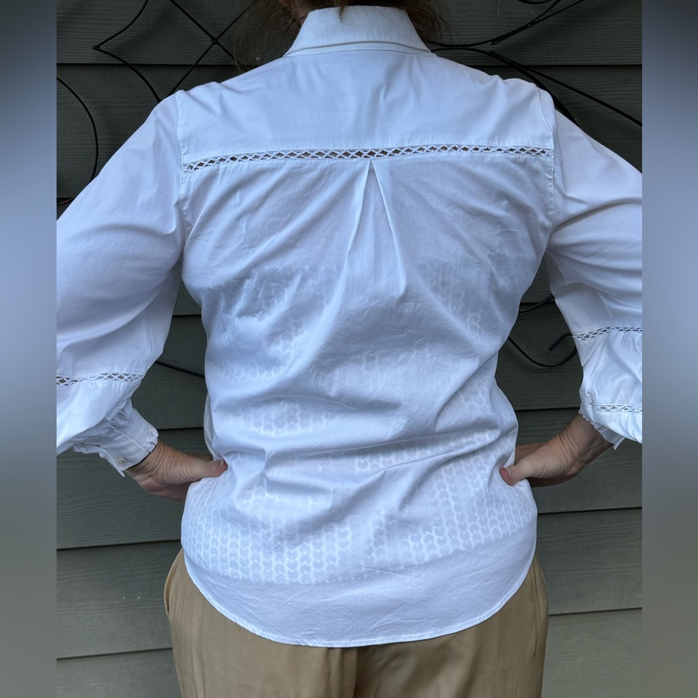 This is a Chicos business shirt, size 1 which is a normal size M/8